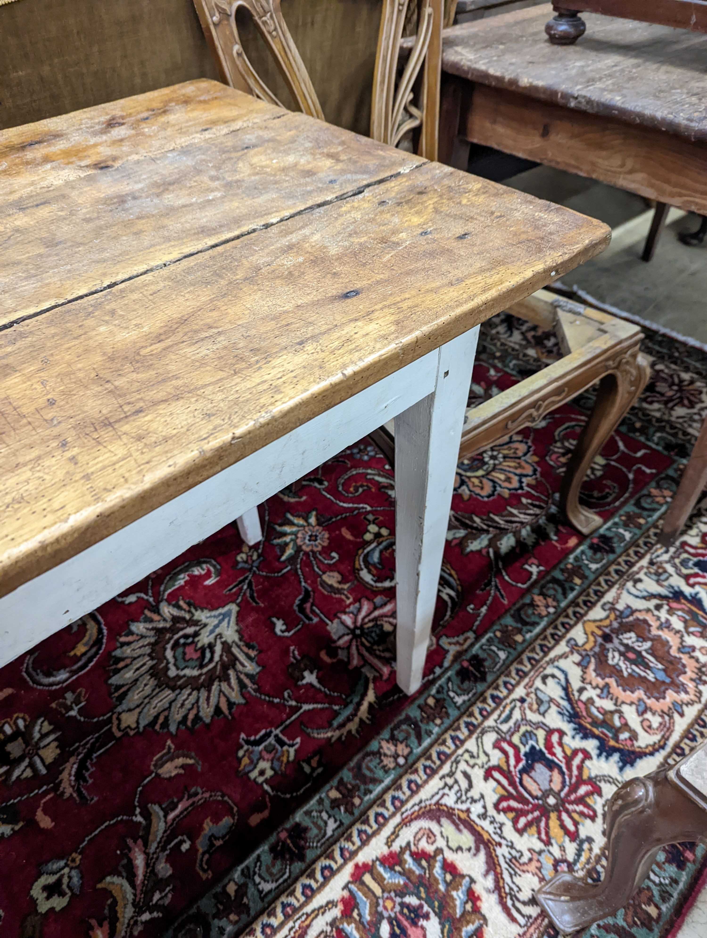 A 19th century French rectangular part painted fruitwood kitchen table. Length -214cm, Depth- 62cm, Height-76cm.